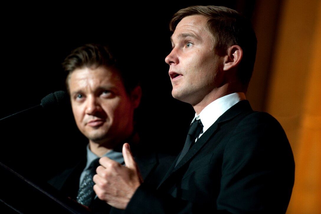"Hurt Locker" actors Jeremy Renner, left, and Brian Geraghty addresses the audience at the annual Tragedy Assistance Program for Survivors Gala in Washington, D.C., April 13, 2010.