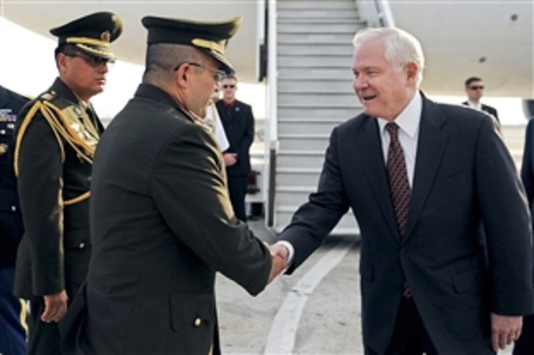 Peruvian officials welcome U.S. Defense Secretary Robert M. Gates as he arrived in Lima, Peru, as part of a four-day trip to South America and the Caribbean, April 13, 2010.