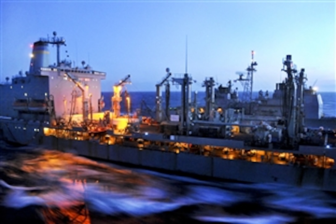 The fleet replenishment oiler USNS Leroy Grumman conducts an underway replenishment with the guided-missile cruiser USS Vella Gulf in the Atlantic Ocean, April 12, 2010. The Vella Gulf is participating in Joint Warrior 10-1, an event that encompasses multi-warfare exercises to improve interoperability between allied navies and prepare participating crews to conduct combined operations during deployment.