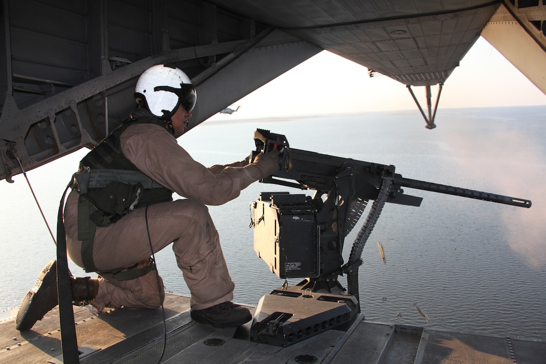 Zamora fires the helicopter mounted .50-caliber machine gun at a stationary target at bombing target 9.