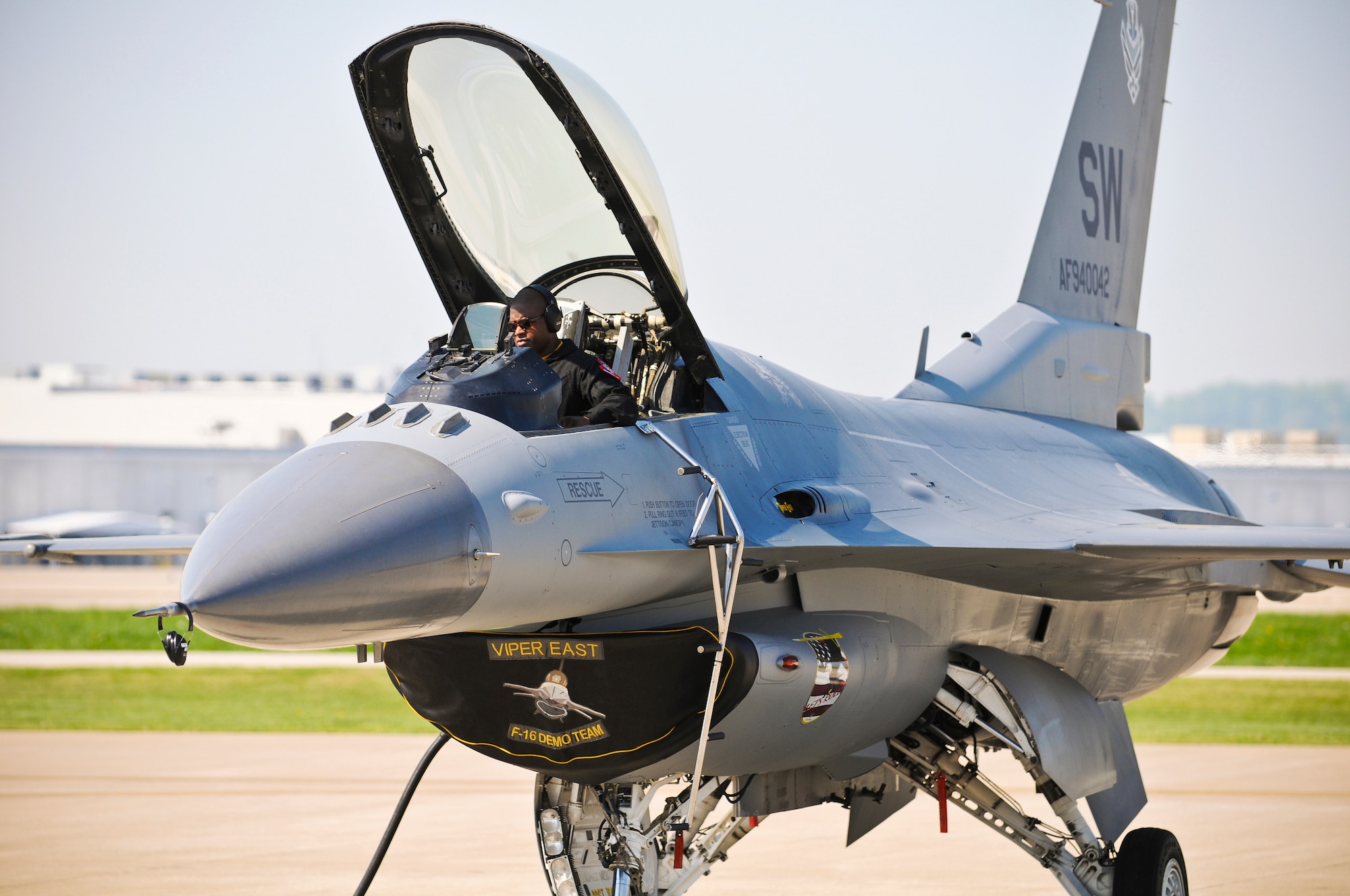 Tech. Sgt. Pierre Julien, a crew chief from the 20th Fighter Wing at Shaw Air Force Base, S.C., configures navigation gear in the cockpit of an F-16 Fighting Falcon while sitting on the flightline of the Kentucky Air National Guard Base in Louisviille, Ky., on April 15, 2010. The aircraft is part of the U.S. Air Force Viper East Demo Team, which is in town to participate in Thunder Over Louisville this weekend. (U.S. Air Force photo by Senior Airman Maxwell A. Rechel)