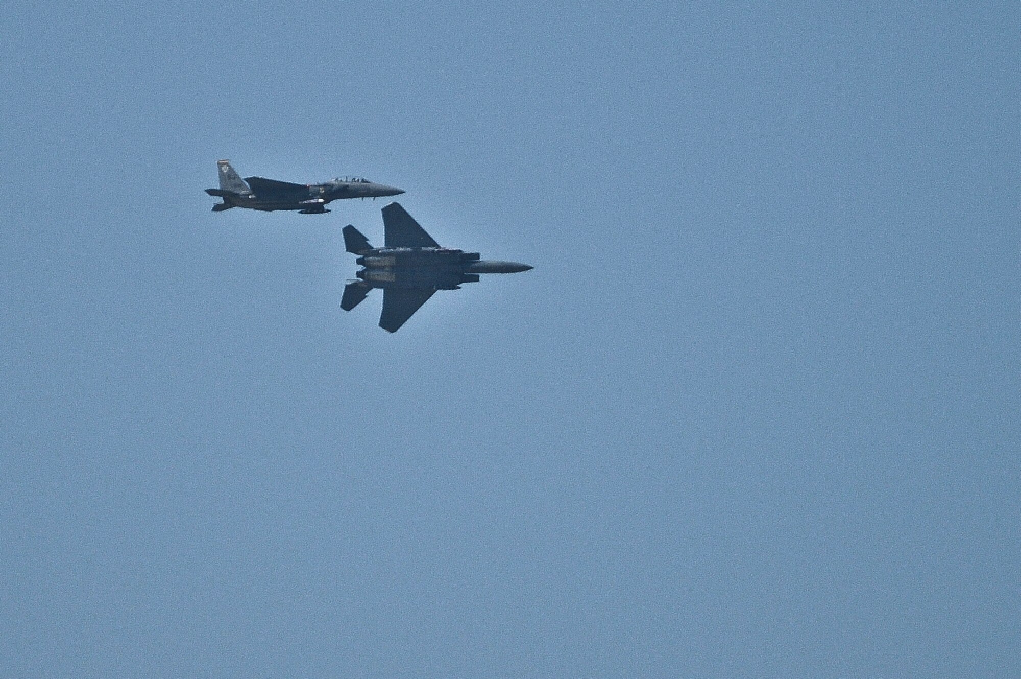 Two U.S. Air Force F-15 Strike Eagles fly over the Kentucky Air National Guard Base in Louisviile, Ky., on April 15, 2010. The F-15s, assigned to the 4th Fighter Wing at Seymor Johnson Air Force Base, N.C., are part of the Strike Eagle Demo Team, which is in town for this weekend's Thunder Over Louisville. (U.S. Air Force photo by Senior Airman Maxwell A. Rechel)