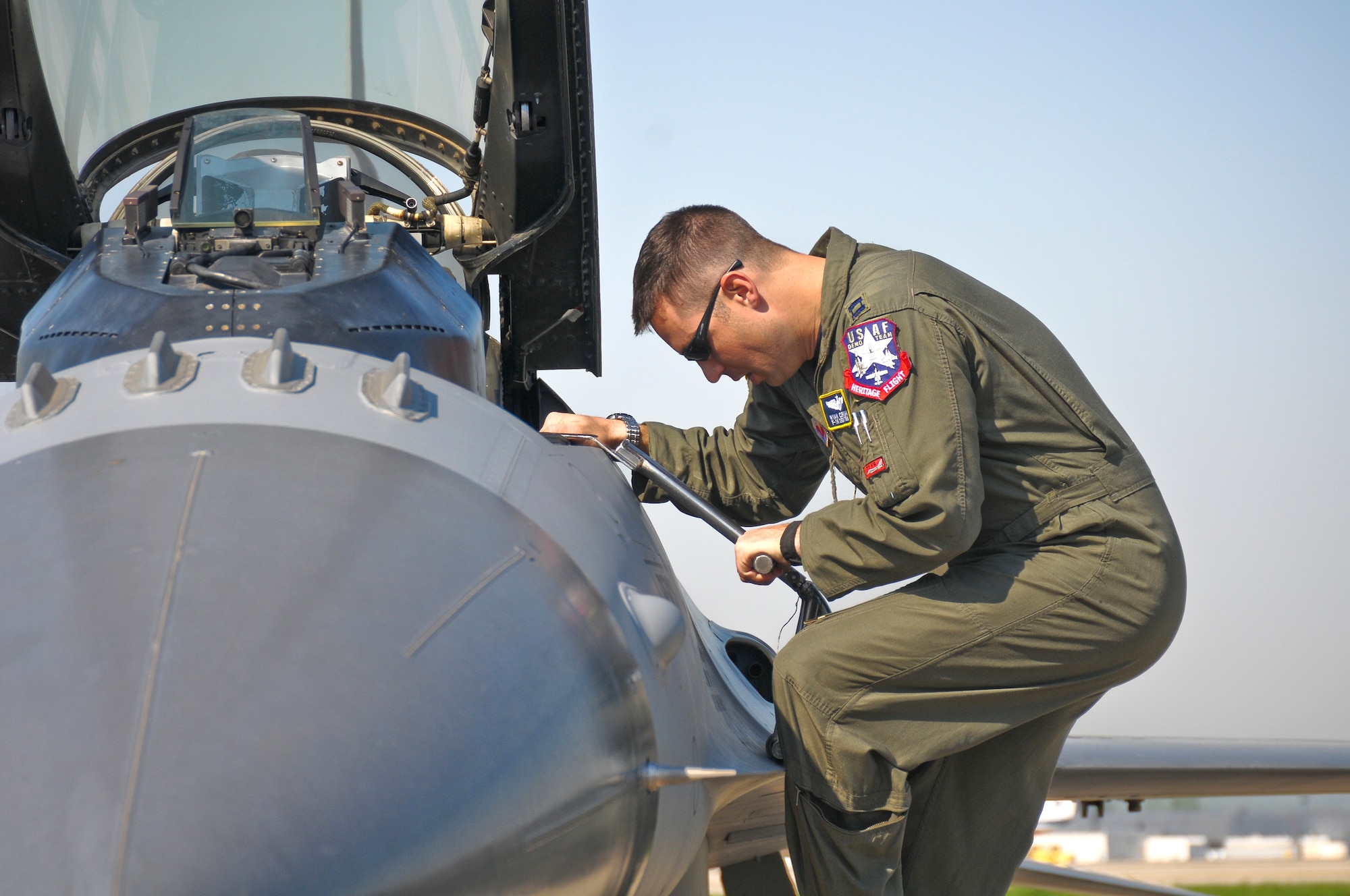 Capt. Ryan Corrigan, a pilot with the 20th Fighter Wing at Shaw Air Force Base, S.C., exits his F-16 Fighting Falcon at the Kentucky Air National Guard Base In Louisville, Ky., on April 15, 2010. Captain Corrigan's  F-16 is part of the U.S. Air Force Viper East Demo Team that will be performing in this weekend's Thunder Over Louisville airshow. (U.S. Air Force photo by Senior Airman Maxwell A. Rechel)
