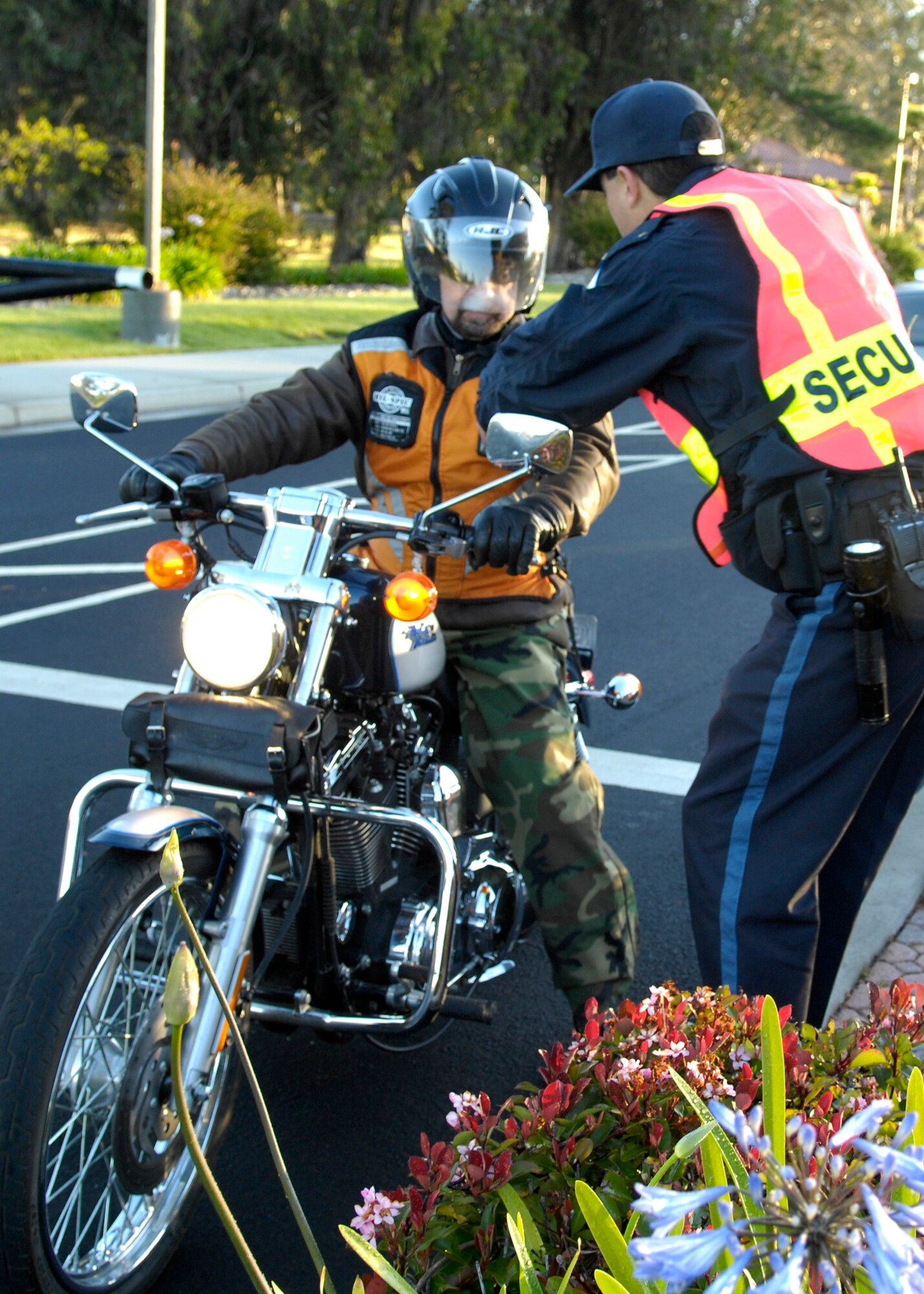 VANDENBERG AIR FORCE BASE, Calif. – Gate guards here conduct daily proper protective equipment inspections with all inbound motorcyclists before allowing base access. As a general motorcycle refresher, the 30th Space Wing safety office is hosting a motorcycle all call at the base theater from 9 – 10 a.m. April 21. (U.S. Air Force photo/Airman 1st Class Lael Huss)
