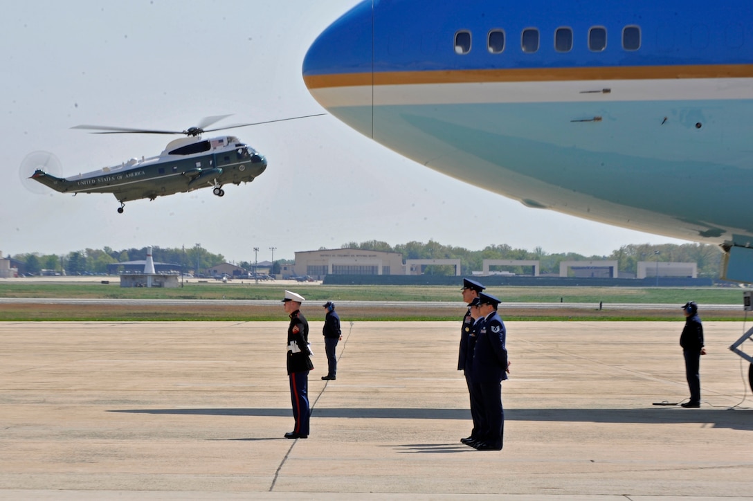 Marine One lands, April 15, 2010, at Joint Base Andrews, Md. President Obama left from Andrews for the Kennedy Space Center in Cape Canaveral, Fla., to announce his new space program.  (U.S. Air Force photo by Airman 1st Class Perry Aston) (Released)


