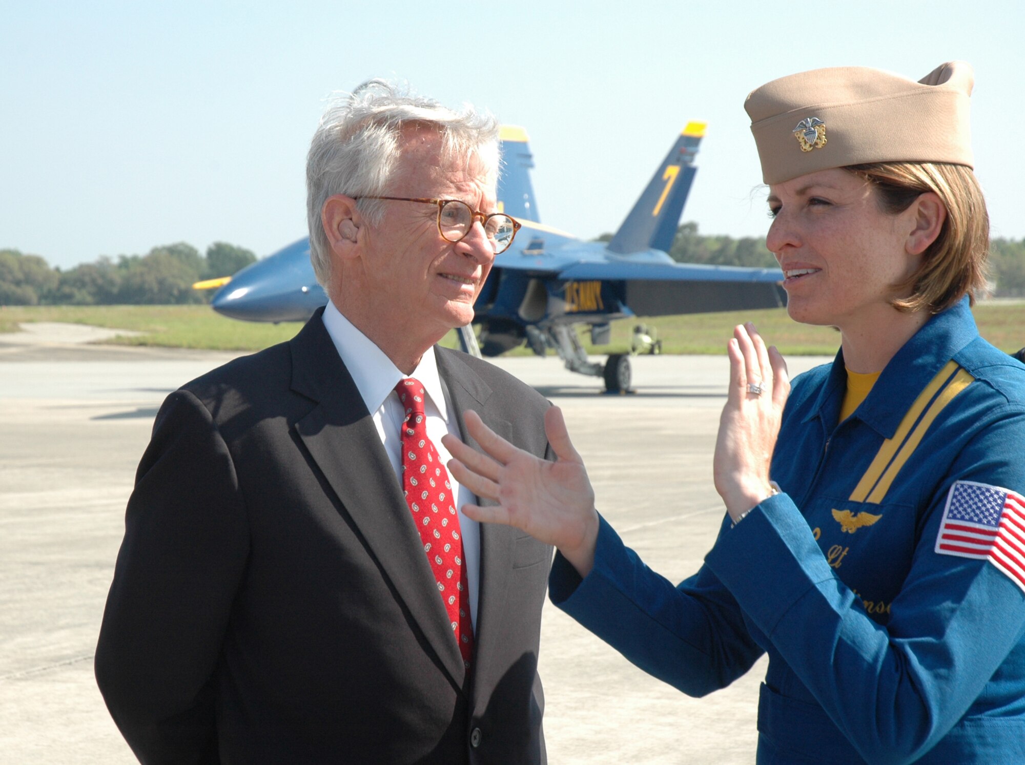 Blue Angels pilot Lt Amy Tomlinson meets with Charleston Mayor Joe Riley at Charleston Air Force Base, S.C. Lt Tomlinson and the other Blue Angels are in Charleston this weekend for airshows on Saturday and Sunday at 2 p.m. (U.S. Air Force photo/2nd Lt Joe Simms)
