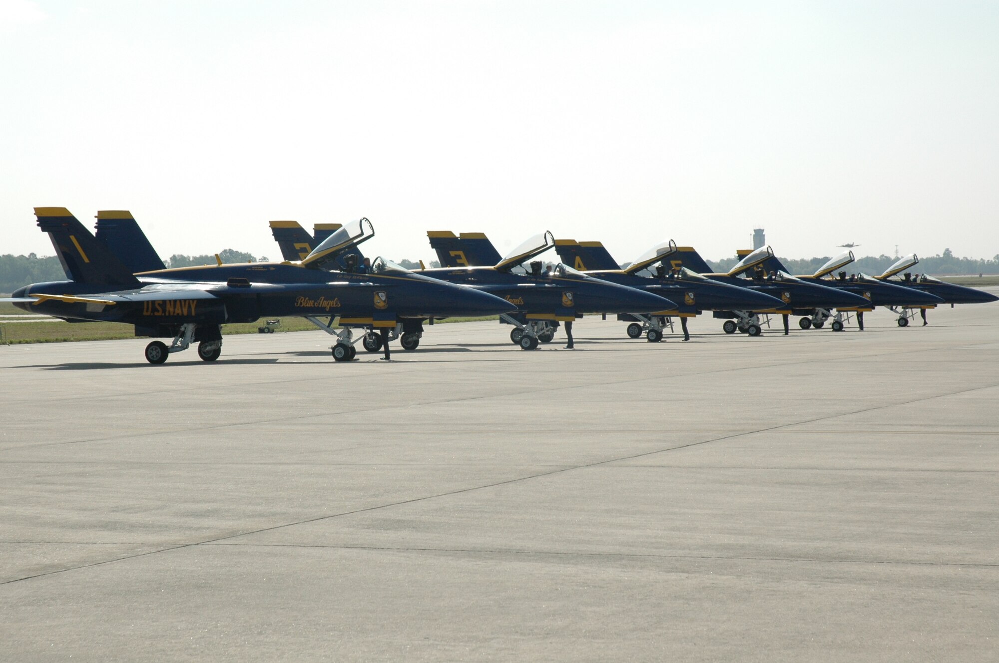 The Blue Angels' F-18 Hornets line the ramp at Charleston Air Force Base S.C. Thursday before thier practice runs today and Friday. The Navy and Marine pilots will be performing for one hour Saturday and Sunday at 2 p.m. and a practice run Friday between 2:30 and 4 p.m over Charleston Harbor., (U.S. Air Force photo/2nd Lt Joe Simms)