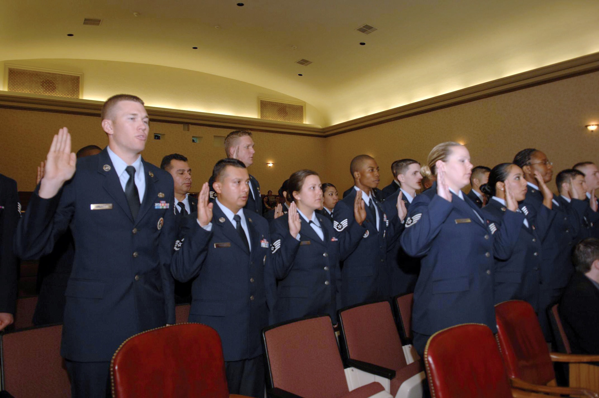 New March ARB noncommissioned officers take an oath during the NCO Induction Ceremony at the Cultural Resources Center, March 28. The Induction Ceremony is an Air Force tradition which serves as a rite of passage to those selected for advancement in the noncommissioned officer corps and the senior noncommissioned officer corps. 

The staff sergeant inductees were: Chad Boersma, Stephan Chavez, Shelly Edwards, Adriana Garcia, Sarah Garcia, Edward Koo, James Marquez, Daniel McDowell, Randall Miller, Shawna Mohr, Klevontey Morgan, Alejandro Pedraza, Kyle Platt, Andrew Plock, D’Angelo Price, Jorge Ramos, Brendan Ryan, Katiria Sanchez, Angeline Santos, Jason Smith, Daniel Stephens, Darryl Tamayo, Milorad Vulovic and James Wendte. 

The master sergeant inductees were: Elizabeth Buckingham, Joseph Craft, Scott Clonkey, Gary Gillespie, Jonathan Gaygay, Taneisha Hardaway, Terri Harmon, Robert Hill, David Hoopes, Kim¬berly Jones, Ferdinand Kabigting, Jeremy Knox, Jim Lambert, Summer Mize, Willard Ramseur, Robert Smythe, Lucia Torres, Christopher Walls and Darrell Watts. (U.S. Air Force photo by Staff Sgt. Samara Scott)