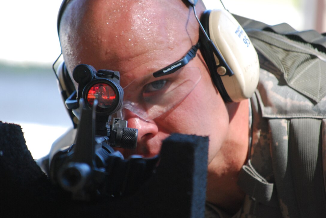 Tech. Sgt. Steven Conard readies his M16 during target practice April 7 at the Patrick Air Force Base range. Sergeant Conard is the leader of the Security Forces team that will represent the 45th Space Wing at the 2010 Guardian Challenge. (U.S. Air Force photo/Daniel Wade)