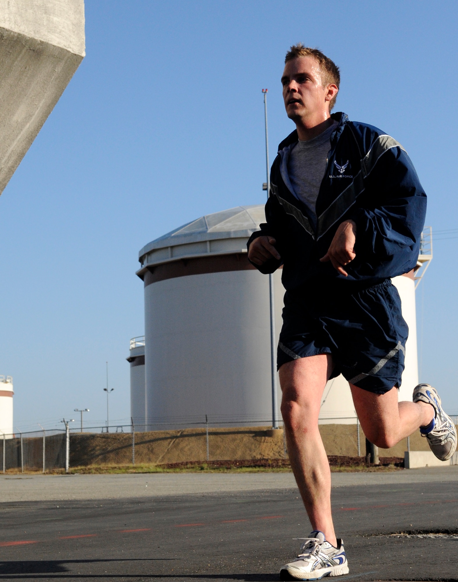LANGLEY AIR FORCE BASE, Va. - Senior Airman Brandon Bridges, 633d Civil Engineer Squadron, pushes toward the finish line during the Tax Day 10k run April 15. Approximately 60 members signed up for the fun run, which aimed to relieve stress and celebrate the completion of tax season. (U.S. Air Force photo/Senior Airman Dana Hill)
