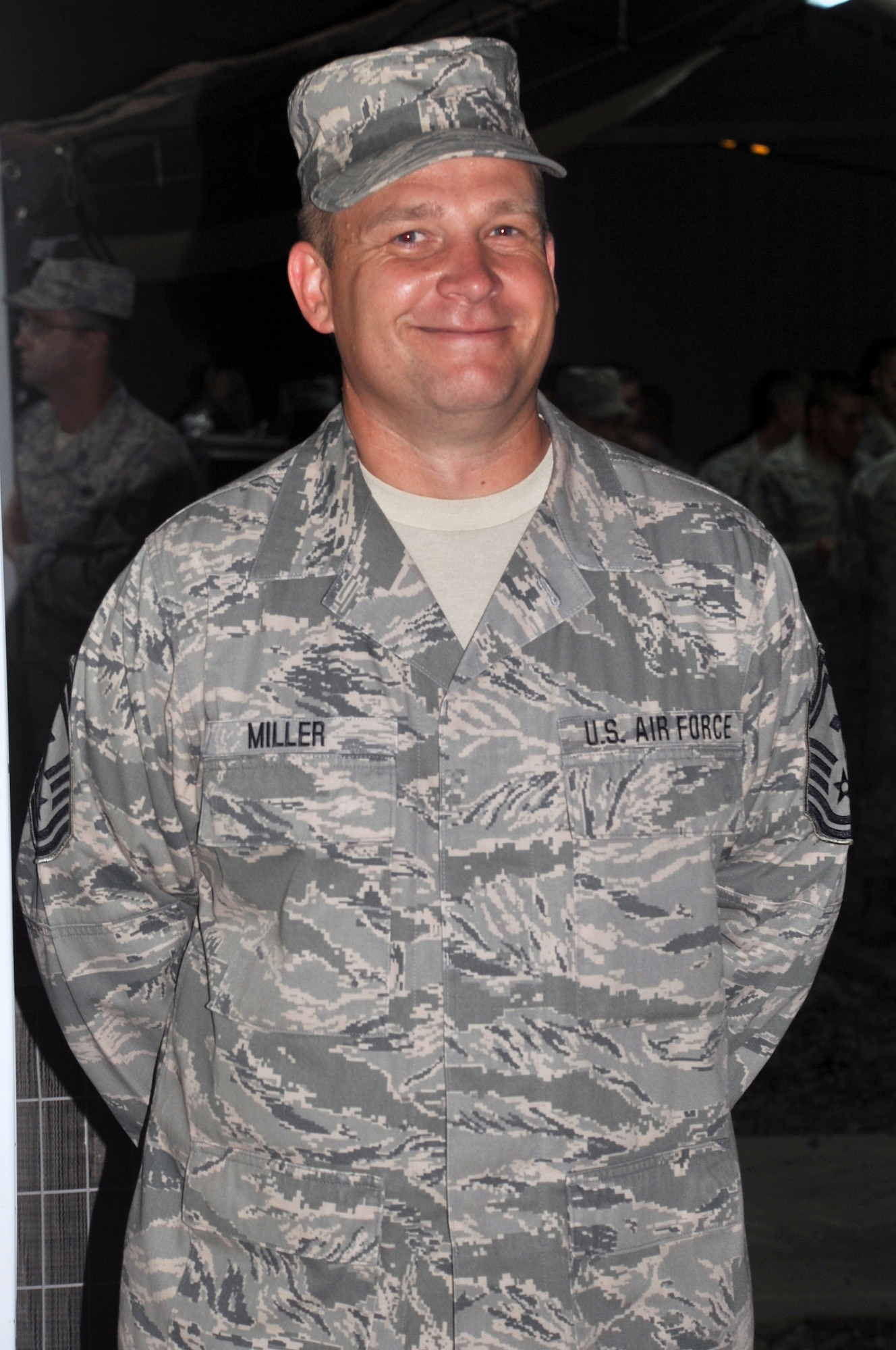 Senior Master Sgt. Mark Miller, first sergeant for the 380th Expeditionary Force Support Squadron, works during a 380th Air Expeditionary Wing event at a non-disclosed base in Southwest Asia on April 12, 2010. Sergeant Miller is deployed from the 133rd Test Squadron at Fort Dodge, Iowa -- a geographically-separated unit of the 185th Air Refueling Wing at Sioux City, Iowa. He is a resident of Humboldt, Iowa, and his hometown is Sioux City. (U.S. Air Force Photo/Master Sgt. Scott T. Sturkol)