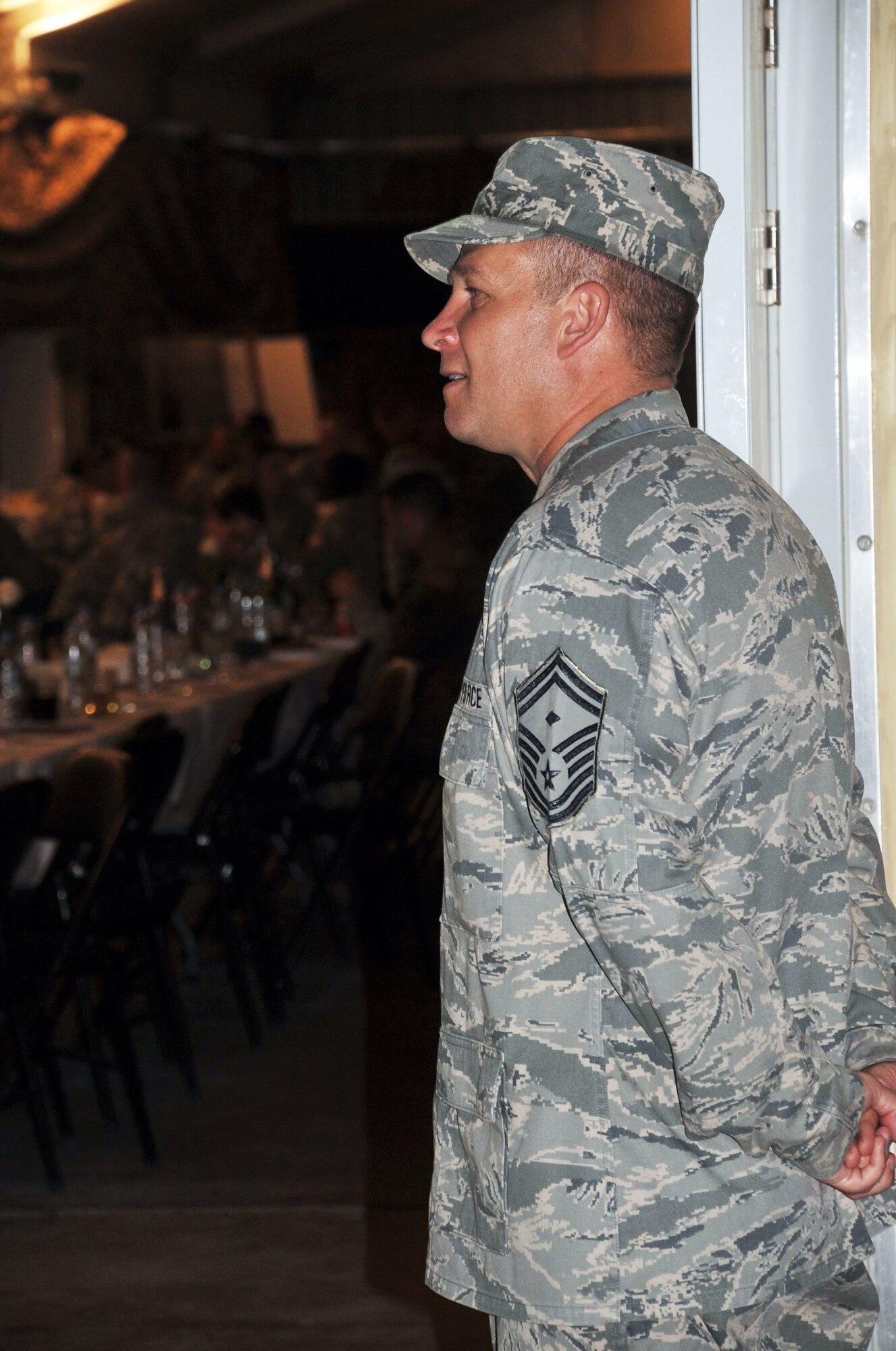 Senior Master Sgt. Mark Miller, first sergeant for the 380th Expeditionary Force Support Squadron, works during a 380th Air Expeditionary Wing event at a non-disclosed base in Southwest Asia on April 12, 2010. Sergeant Miller is deployed from the 133rd Test Squadron at Fort Dodge, Iowa -- a geographically-separated unit of the 185th Air Refueling Wing at Sioux City, Iowa. He is a resident of Humboldt, Iowa, and his hometown is Sioux City. (U.S. Air Force Photo/Master Sgt. Scott T. Sturkol)