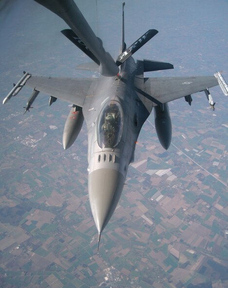 RAF MILDENHALL, England – A Spangdhalem Air Base, Germany, F-16 Fighting Falcon refuels off a 100th Air Refueling Wing KC-135 during Exercise BRILLIANT ARDENT April 15. The large scale NATO Response Force Air Live Exercise hosted by Germany began April 12 and will run through April 22. Participation by U.S. Air Forces in Europe units directly aligns with the command key mission areas of providing forces for global operations and building partnership. (U.S. Air Force photo/Tech. Sgt. Kevin Wallace)