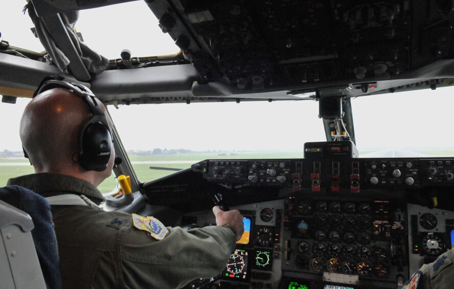 RAF MILDENHALL, England – Col. Chad Manske, 100th Air Refueling Wing commander, pulls back on the controls of the KC-135 Stratotanker as he lifts the aircraft airborne. The colonel piloted the plane during Exercise BRILLIANT ARDENT April 15. (U.S. Air Force photo/1st Lt. Matthew Greenspan)