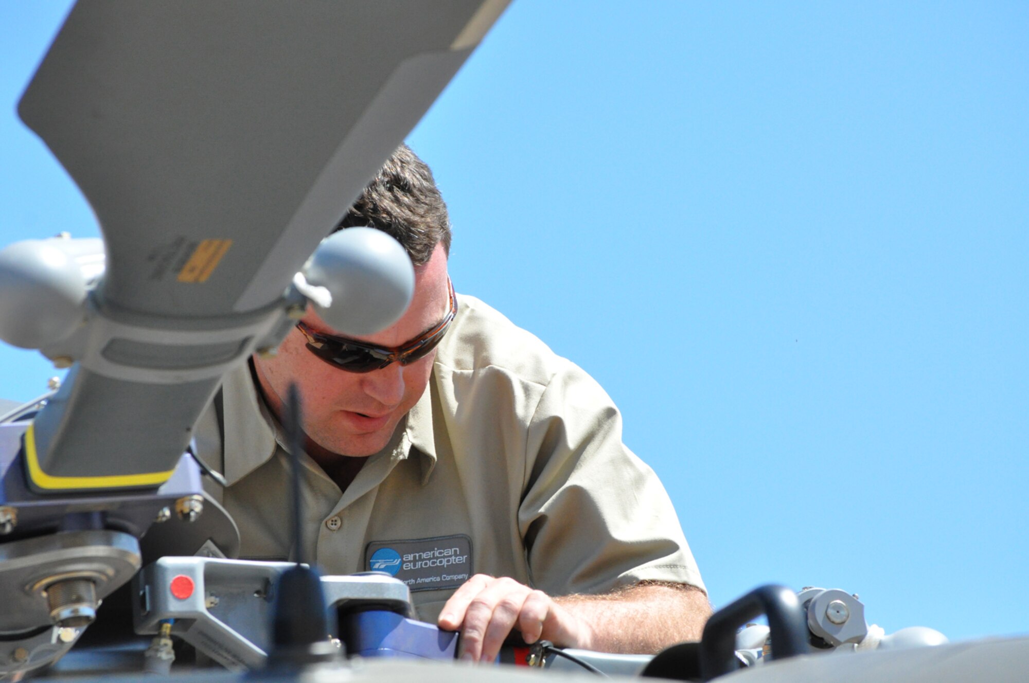 James Wagner and Terry Teer help pack UH-72 Lakota helicopter blades for transport from Columbus AFB, Miss., to Germany, April 9. Mr. Wagner and Mr. Teer are employees of American Eurocopter, Columbus, Miss., the manufacturer of the UH-72 Lakota. (U.S. Air Force photo/Senior Airman Jacob Corbin). 