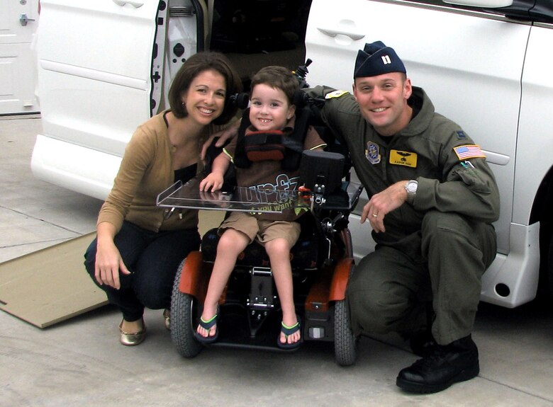 Capt. Aaron High, his wife Traci and son Max join for a photo outside their home on his third birthday, Nov. 9, 2009, at Joint Base Charleston S.C. At 10 months old, Max was diagnosed with spinal muscular atrophy. (Courtesy photo)