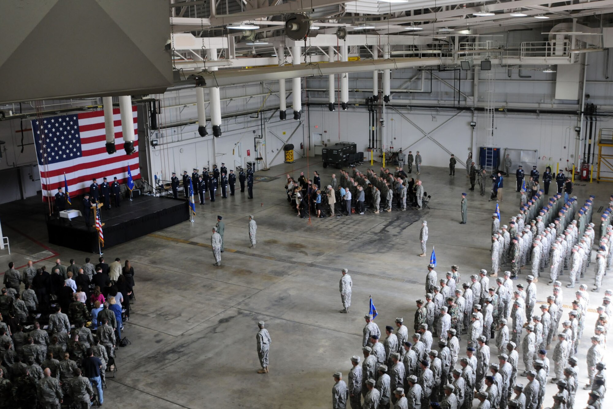 YOUNGSTOWN AIR RESERVE STATION, Ohio -- Citizen Airmen of the Air Force Reserve's 910th Airlift Wing and honored guests participate in a wing change of command ceremony in a hangar here, April 11. Col. Fritz Linsenmeyer assumed command of the 910th Airlift Wing from Col. Karl McGregor during the event. Col. McGregor assumed command of the 452nd Air Mobility Wing at March Air Reserve Base, Calif., March 27. Col. Linsenmeyer's previous assignment was commander of the 916th Air Refueling Wing, an Air Force Reserve unit at Seymour Johnson Air Force Base, NC. As commander of the 910th, Col. Linsenmeyer is the leader of more than 1800 Citizen Airmen, Air Reserve Technicians and civil service employees and has operational control of 12 C-130H tactical cargo transport aircraft. U.S. Air Force photo by Tech. Sgt. Rick Lisum.