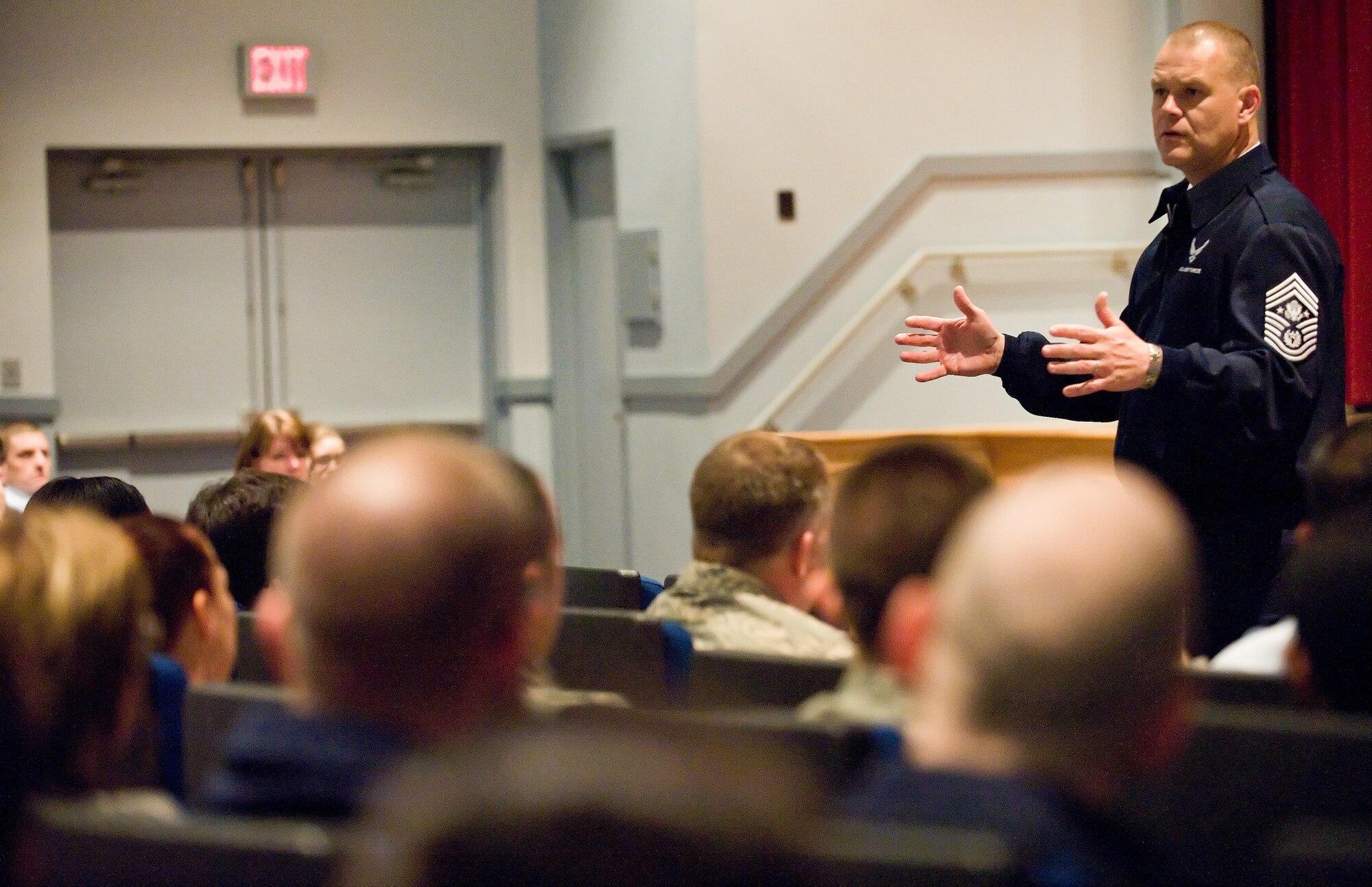 Chief Master Sgt. of the Air Force James A. Roy talks to Airmen during an enlisted call at the Base Theater April 12.  Topics included health care, the new fitness exam and the ?don?t ask, don?t tell? policy.  (U.S. Air Force photo/Roland Balik)
