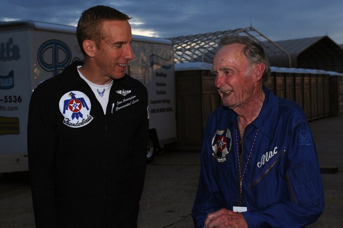 EGLIN AIR FORCE BASE, Fla.--Lt. Col. Case Cunningham, commander/leader of the U.S. Air Force Air Demonstration Squadron "Thunderbirds" talks with retired Col. Bob McCormick at Eglin's 75th Anniversary Open House and Air Show April 10. Colonel McCormick was part of the original Thunderbirds team and designed the patch the squadron still wears today. (U.S. Air Force photo by Staff Sgt. Richard Rose)