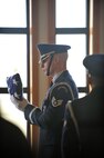 MANDAN, N.D. – Staff Sgt. Ernest Willich, 91st Missile Security Forces Squadron command support staff noncommissioned officer-in-charge, prepares to present the United States flag at the North Dakota Veterans Cemetery in Mandan, N.D., April 12. The purpose of the base honor guard is to give honor to military members during a variety of ceremonies, including funerals. (U.S. Air Force photo by Senior Airman Ashley N. Avecilla)