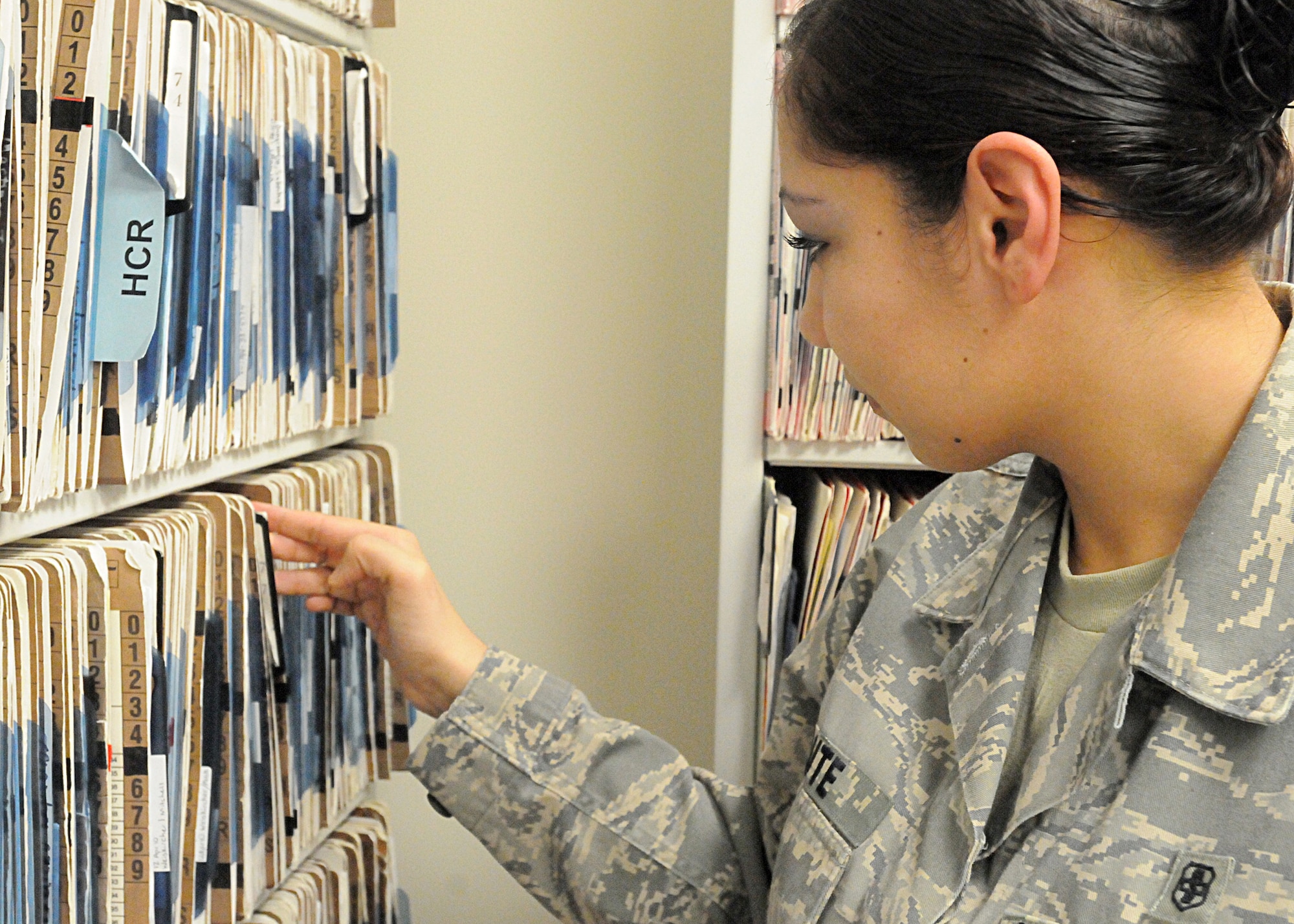 Airman 1st Class Karmalita Lute, 31st Dental Squadron dental technician, files patient records April 14 at the dental clinic. The 31st DS supports the readiness of the 31st Fighter Wing and associated units by providing optimal patient-focused dental care using internal, Department of Defense and host nation resources. (U.S. Air Force photo/Senior Airman Tabitha M. Mans)