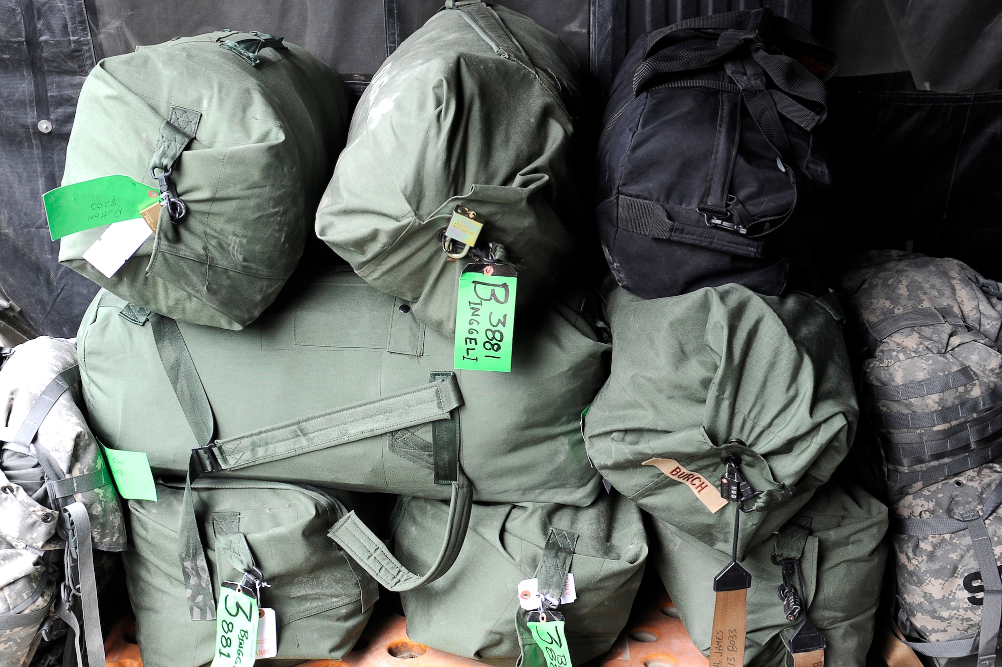 Baggage is stacked in a holding area until Airmen from the 455th Expeditionary Aerial Port Squadron palletize it at Bagram Airfield, Afghanistan, April 14, 2010. (U.S. Air Force photo by/ Tech. Sgt. Jeromy K. Cross/released)







