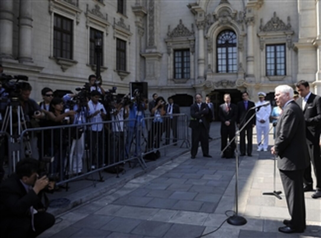 Secretary of Defense Robert M. Gates and Peruvian Minister of Defense Rafael Rey talk to the press outside the Presidential Palace after meeting with President Alan Garcia in Lima, Peru, on April 14, 2010.  