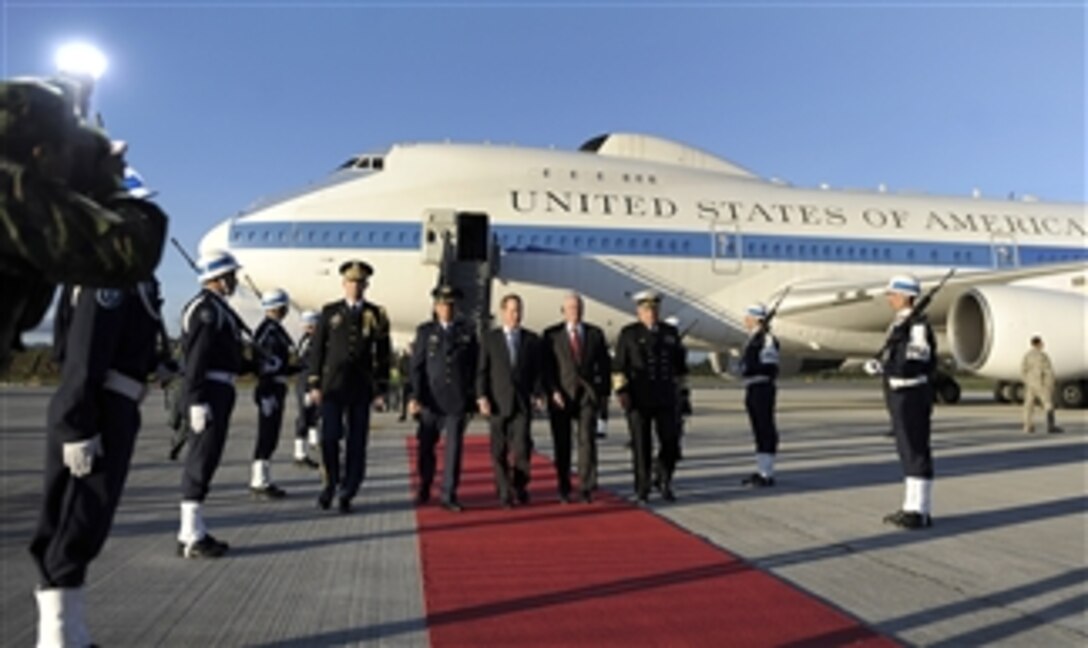 Secretary of Defense Robert M. Gates and U.S. Ambassador to Colombia William R. Brownfield walk through an honor cordon after Gates arrived in Bogota, Colombia, on April 14, 2010.  