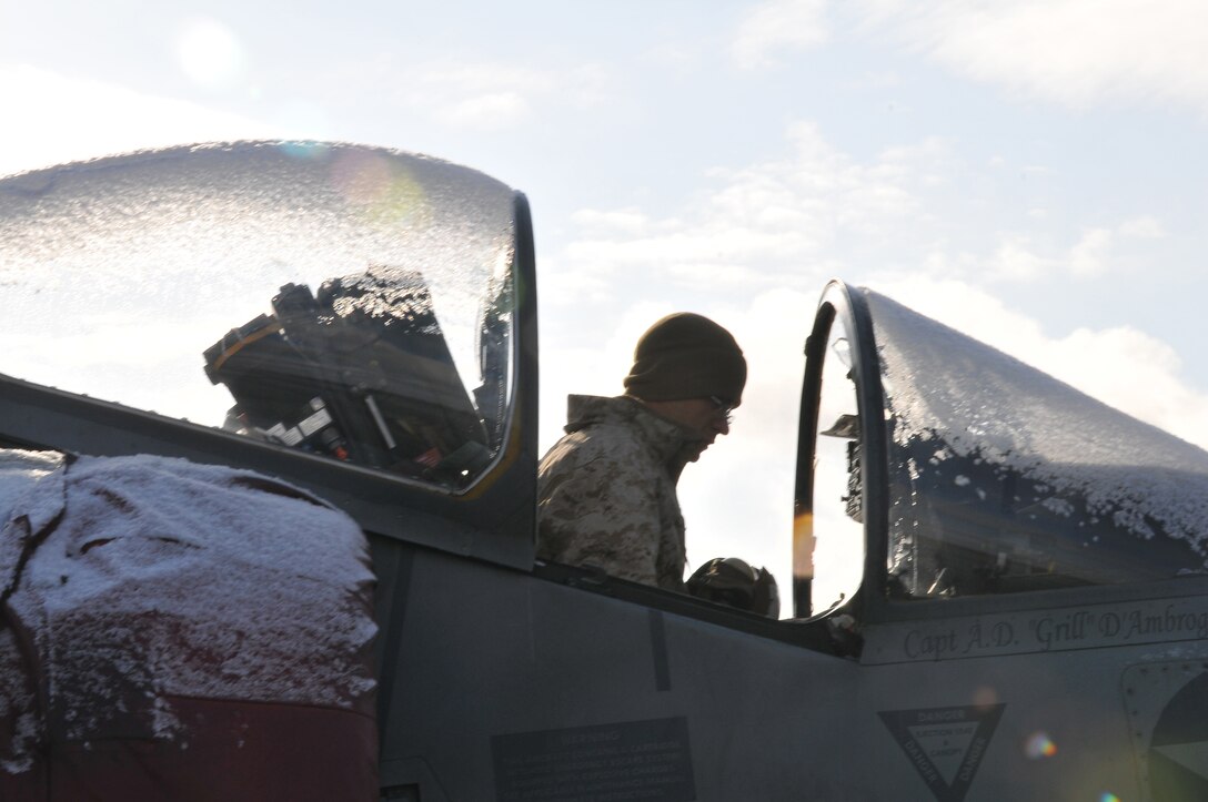 Cpl. William Holly, Marine Attack Squadron 211 powerline mechanic, inspects a squadron AV-8B Harrier at the flight line of Eielson Air Force Base in Alaska, April 15, 2010. More than 160 Marines from VMA-211 and Marine Aviation Logistics Squadron 13 flew north to participate in Exercise Red Flag-Alaska, one of the largest joint-service exercises in the U.S. military. The mission goal as stated in the welcome brief on April 15 is for the squadron's to leave "more educated, better trained, more capable, and more prepared for combat."