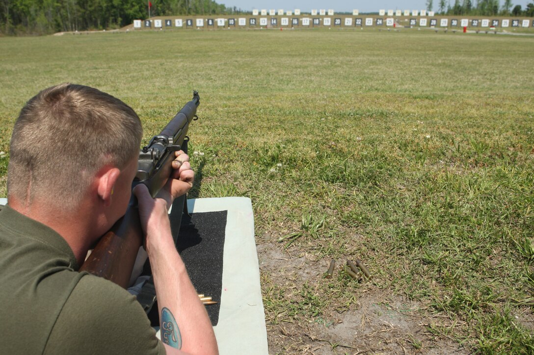 Cpl. Jared Myers, a Marine attached to the Wounded Warrior Battalion-East, aims down the sights of an M1 Garand rifle during an M1 for Vets visit to Marine Corps Base Camp Lejeune, April 16. M1s for Vets is a non-profit organization dedicated to introducing veterans of OIF/OEF to shooting and competing with M1 rifles.