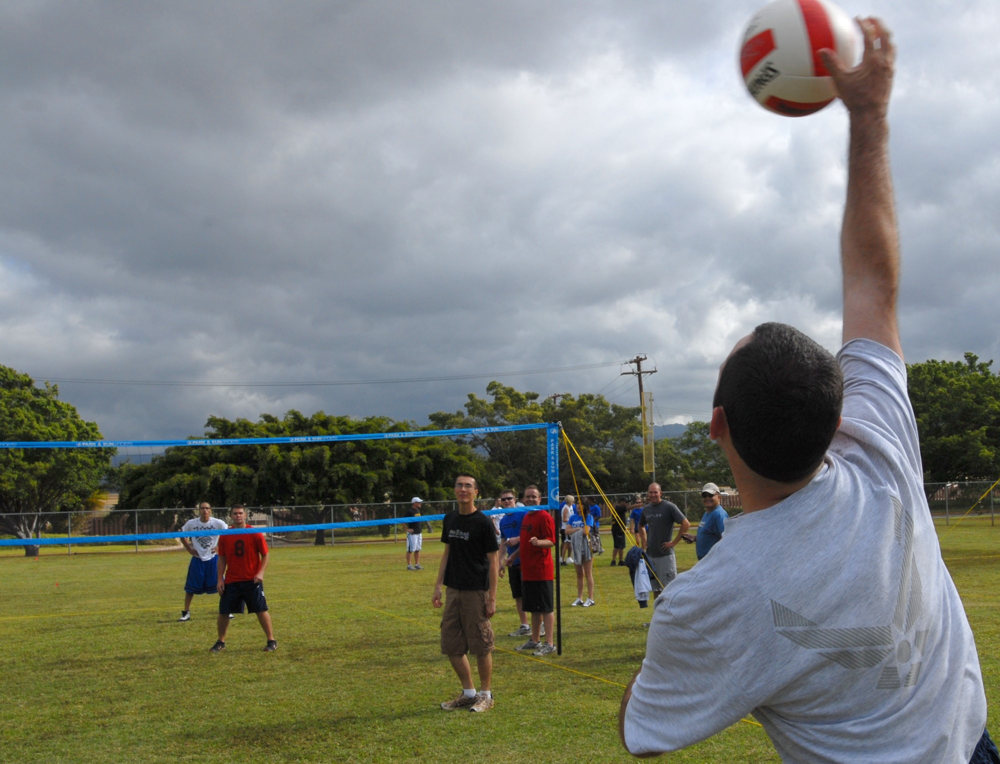 JOINT BASE PEARL HARBOR HICKAM, Hawaii – Senior Airman Nathan Allen, Wing Staff Agency, serves the ball during a volleyball game as part of the Team Hickam Sports Day here, April 16. (U.S. Air Force photo/Senior Airman Gustavo Gonzalez)