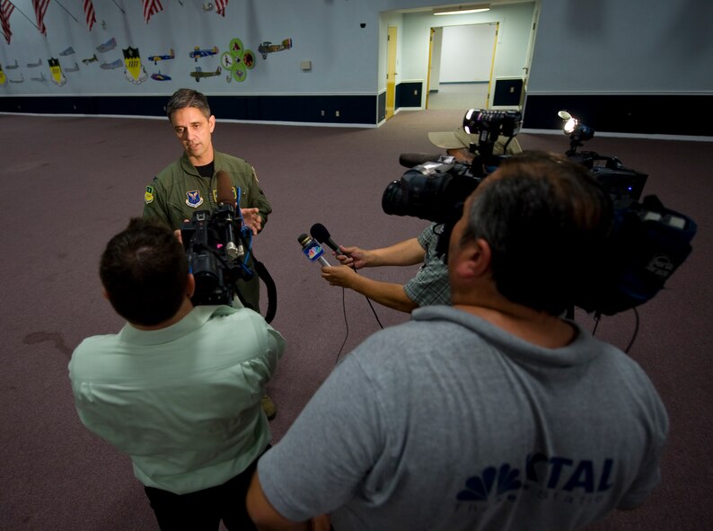 BARKSDALE AIR FORCE BASE, La. – Col. Steven Basham, 2d Bomb Wing commander, speaks to local media following a Major Accident Response Exercise here April 16. The MARE was conducted to test the readiness of emergency response personnel in the event of an accident during the upcoming air show. (U.S. Air Force photo by Airman 1st Class Chad Warren) (RELEASED)