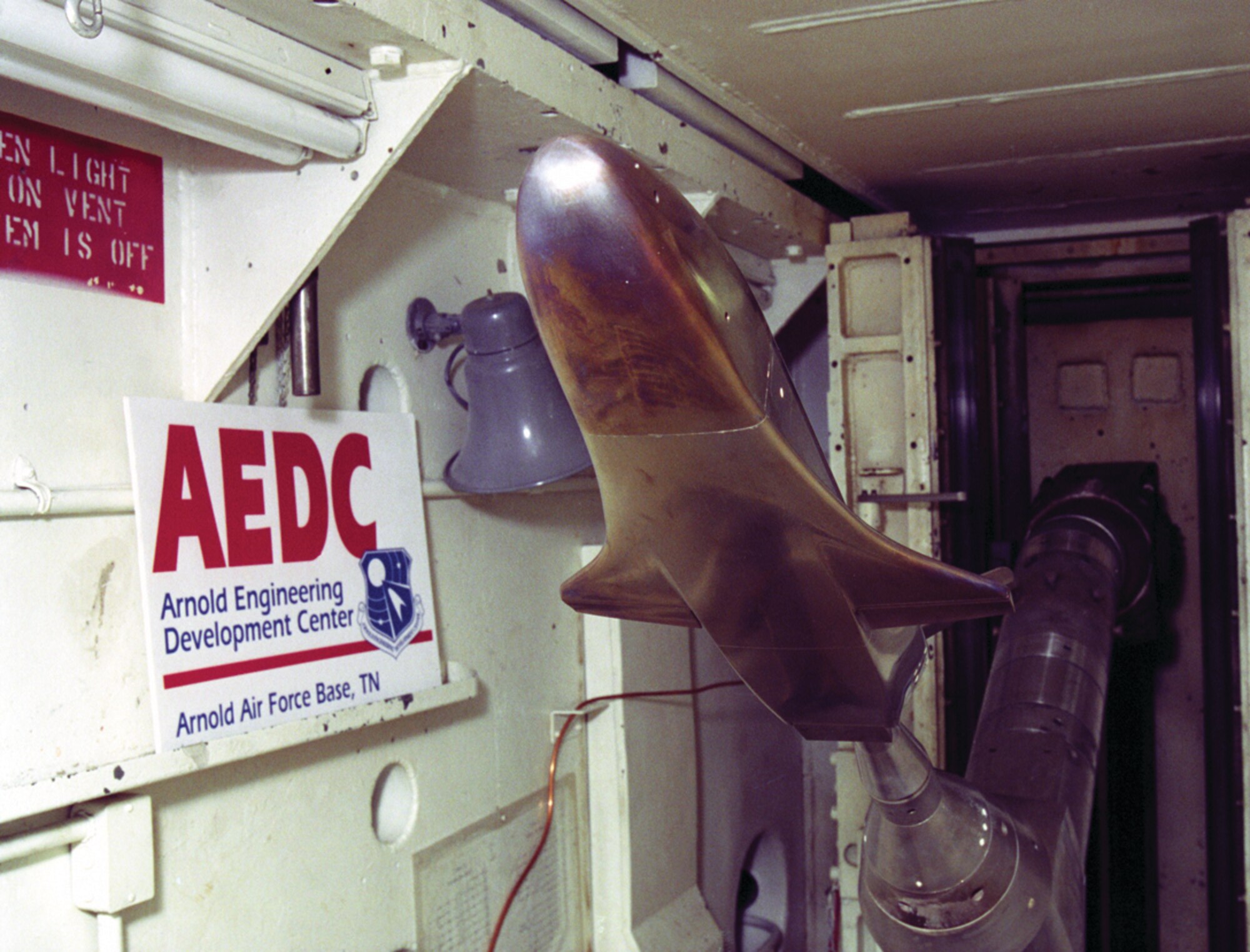 A 6-percent scale model of NASA’s X-37 underwent testing in AEDC’s von Kàrmàn Gas Dynamics Facility wind tunnels A, B and C to establish how redesigns to the demonstrator spacecraft’s control jet nozzles and body flap affected its aerodynamics during reentry into and through the Earth’s atmosphere.