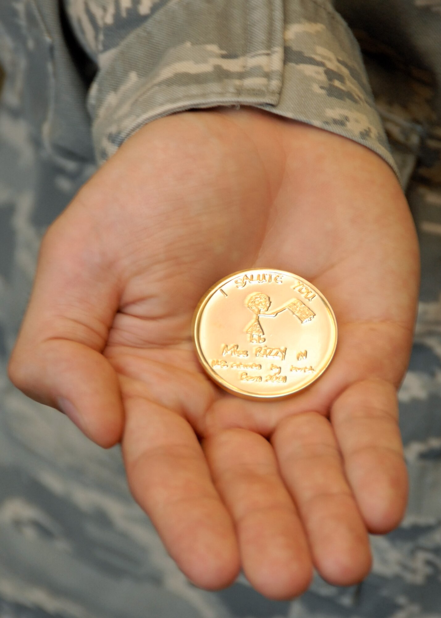 "Rizzys Coin."  (U.S. Air Force photo/Samuel King Jr.)