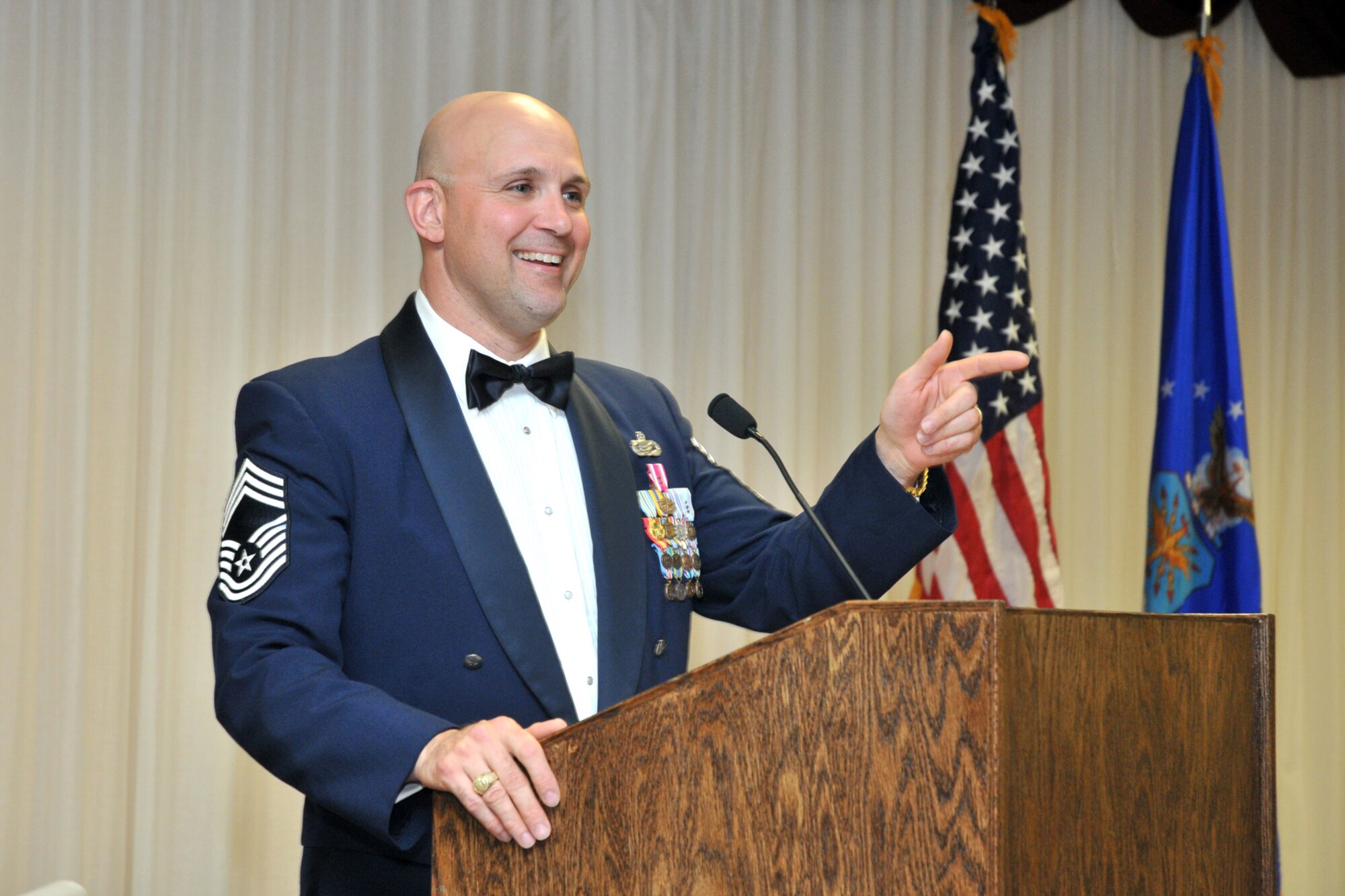 Chief Master Sgt. Damian Orslene speaks at an Airman Leadership School graduation March 30, 2010, at Keesler Air Force Base, Miss. Chief Orslene is competing in the inaugural Warrior Games May 10 through 14, 2010, in Colorado Springs, Colo. Chief Orslene was injured while deployed to Iraq. He is the 81st Training Support Squadron superintendent. (U.S. Air Force photo/Adam Bond)