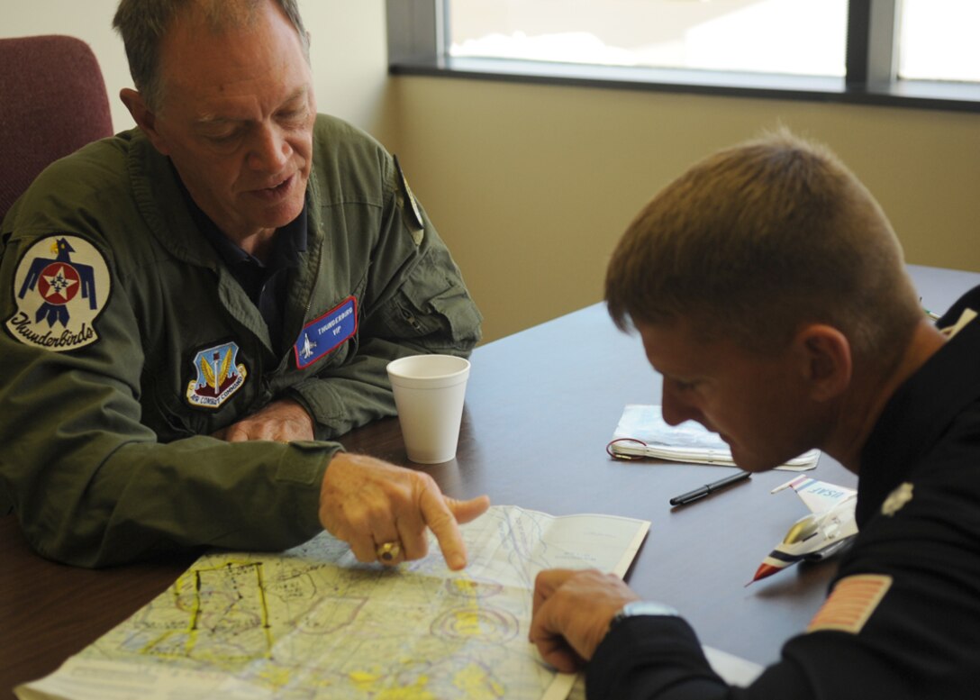 Before his familiarization flight April 15, 2010, at Nellis Air Force Base, Nev., Randy Babbitt (left), the administrator of the Federal Aviation Administration, receives a preflight briefing from Thunderbirds No. 7 pilot Lt. Col. Derek Routt.  (U.S. Air Force photo/Master Sgt. Pam Anderson) 