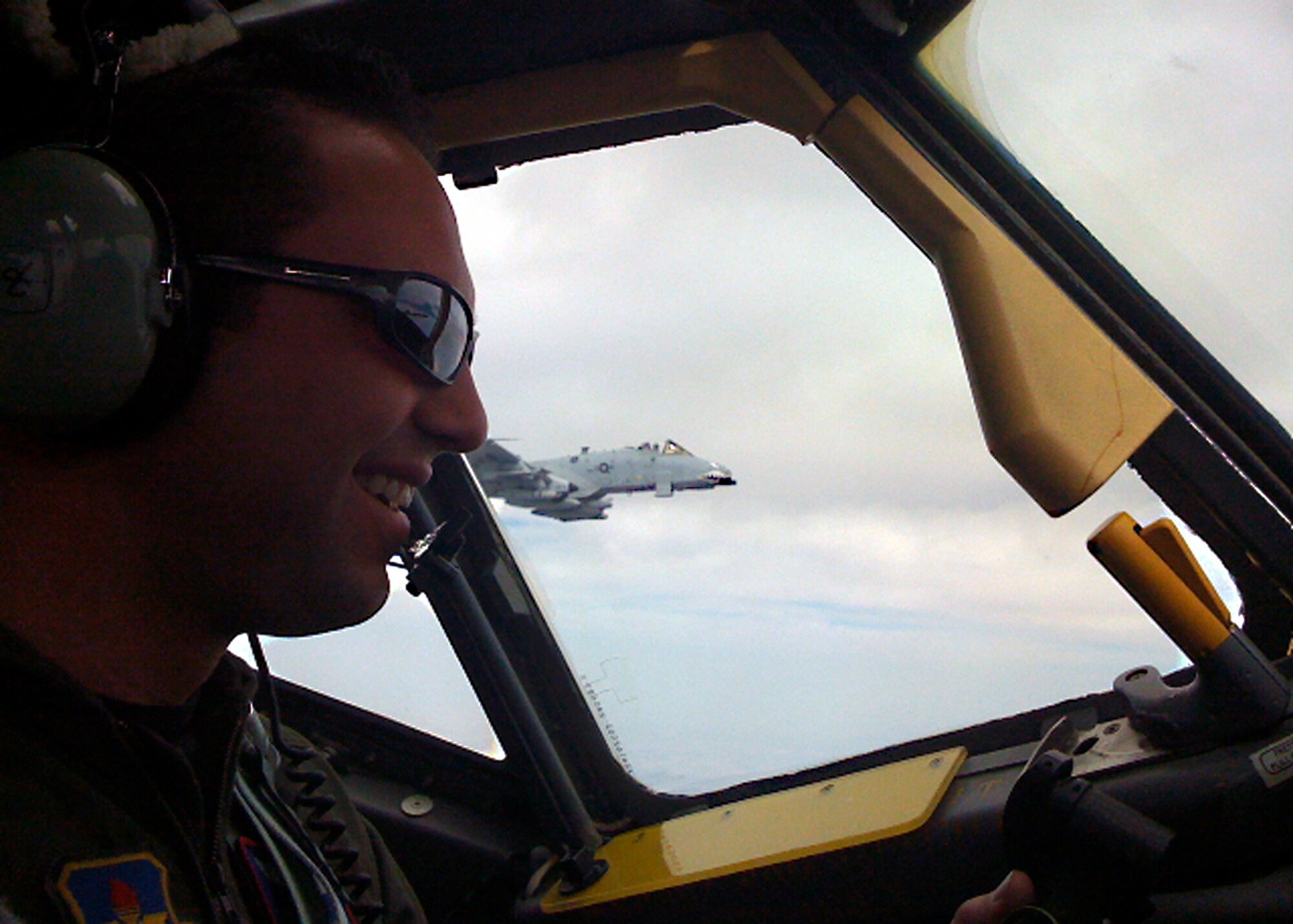Altus AFB, Okla. – U.S. Air Force Maj. Lewis DeMaso, a KC-135 Stratotanker pilot with the 54th Air Refueling Squadron at Altus Air Force Base, provides aerial refueling to his older brother U.S. Air Force Col. William DeMaso, vice commander of the 23rd Wing at Moody Air Force Base, Ga., March 21. Colonel DeMaso received fuel from his brother Major DeMaso for his A-10 Thunderbolt II during his return trip from Tucson back to Moody AFB. The DeMaso brothers are from Maspeth, N.Y. (U.S. Air Force Courtesy Photo/Release 97th Air Mobility Wing- Public Affairs)