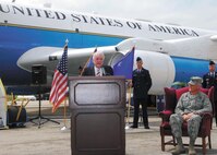 Col. William H. Mott V, 37th Training Wing commander, looks on as retired Lt. Gen. James M. Keck, former Strategic Air Command vice commander, speaks at the dedication of a Boeing KC-135 at the Lackland Training Annex here April 7. Once part of Project Speckled Trout, the aircraft was moved from Kelly Field Annex to its new home at the Lackland Training Annex Feb. 15, culminating a process that began after the historical aircraft arrived here last June from Edwards Air Force Base, Calif. The plane was originally bound for the boneyard in Arizona before being transferred to the 344th Training Squadron. (U.S. Air Force photo/Alan Boedeker)