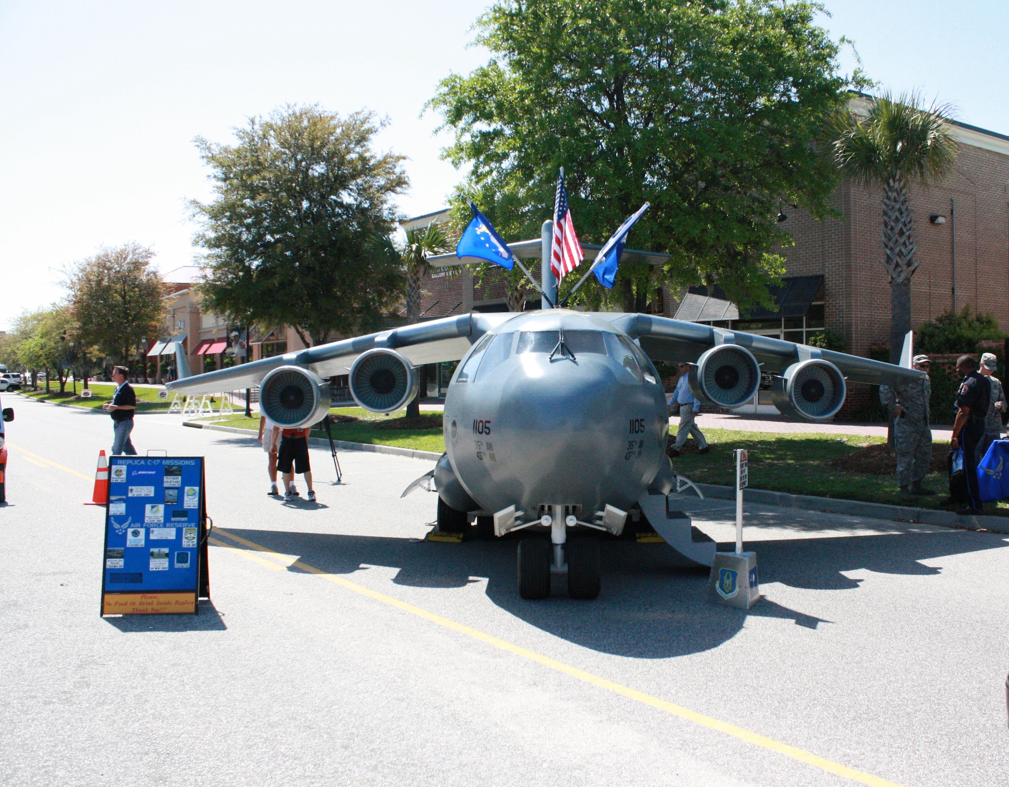 The mini C-17 replica from the 315th Airlift Wing, Charleston Air Force Base, S.C. was a big attraction at the Family Circle Tennis Center Monday April 12 in Charleston. The replica travles the country educating the public on the missions of the C-17 and the Air Force Reserve. This event was the Family Circle Cup women's tennis tournament which drew nealry 90,000 fans last year. (U.S. Air Force Photo/TSgt Elizabeth Holzbaur)