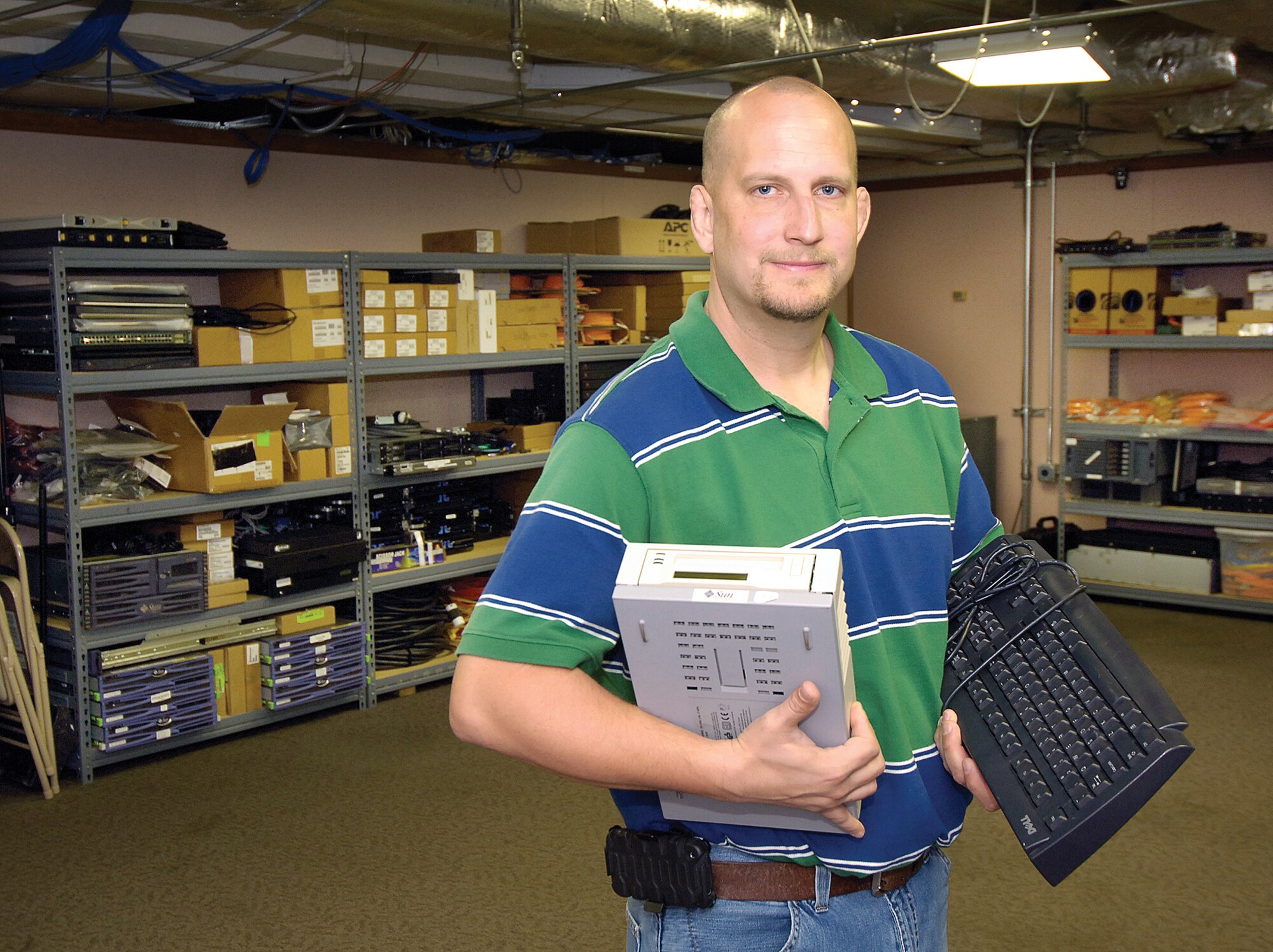 Scott Gill, server administration branch chief in the 72nd Air Base Wing Communications Directorate, plays a key role in keeping the thousands at Tinker up and running with active servers at all times.  

During a recent massive undertaking of consolidating servers, he and others worked to find and remove old, unsupported equipment. That created a mountain of unserviceable gear and quickly turned the server room into a “mess,” described Mr. Gill.  

He and a team cleared the servers, did all the necessary paperwork and sent them to DRMO.  Then Mr. Gill finished the server room cleanup project and turned a mountain of a mess into a “6S poster effort,” one that caught the attention of his commander, Col. Mary Gillam and deputy director Kelley Butler.  

“Scott sees problems and he fixes them,” praised Ms. Butler. “He has endless initiative. He doesn’t wait for someone to tell him what needs to be done, he just does it.”
(Air Force photo by Margo Wright)
