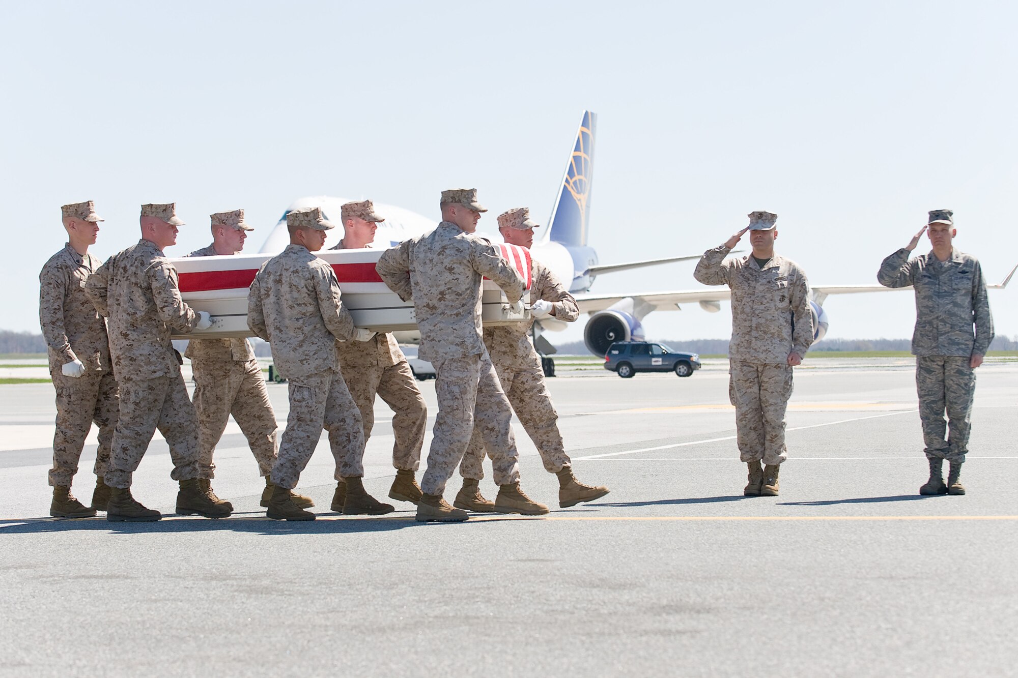 A U.S. Marine Corps team transfers the remains of Marine Corps Lance Cpl. Randy M. Heck, of Steubenville, Ohio, at Dover Air Force Base, Del., April 1. Heck was assigned to 2nd Light Armored Reconnaissance Battalion, 2nd Marine Division, II Marine Expeditionary Force, Camp Lejeune, N.C. (U.S. Air Force photo/Roland Balik)