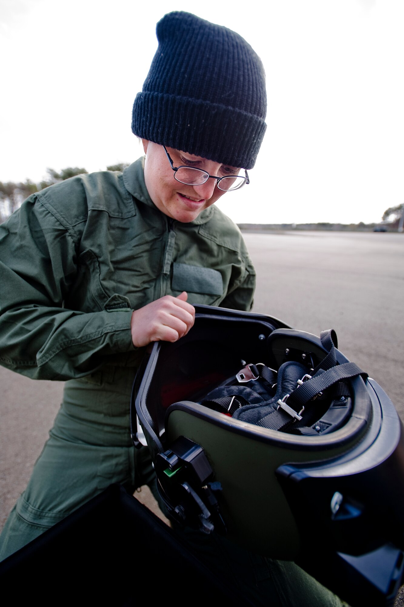 MISAWA AIR BASE, Japan -- Airman 1st Class Danee Hicks, 35th Civil Engineer Squadron explosive ordnance disposal apprentice, prepares an EOD9 bomb-suit helmet April 15 at the Misawa Fire Emergency Services Training Center. The complete suit protects EOD members from explosive hazards. (U.S. Air Force photo/Senior Airman Jamal D. Sutter)