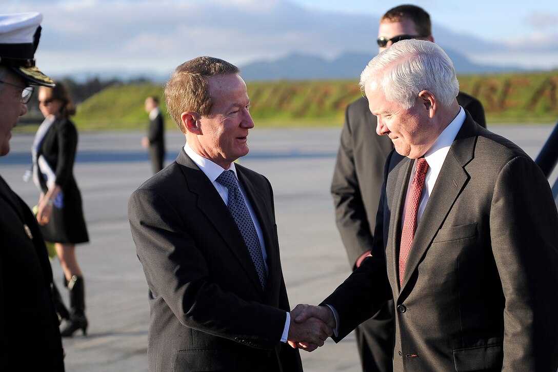 U.S. Defense Secretary Robert M. Gates, right, is greeted by U.S. Ambassador to Colombia William R. Brownfield after the secretary’s arrival in Bogota, April 14, 2010. 