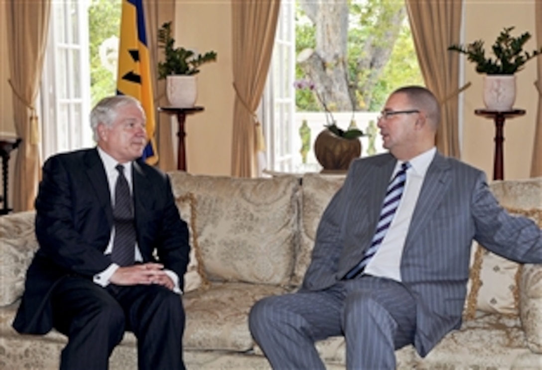 U.S. Defense Secretary Robert M. Gates talks with the Prime Minister of Barbados David Thompson at Ilaro Court, the prime minister's residence, in Bridgetown, Barbados, April 16, 2010. Gates met with the prime and defense ministers of St. Kitts, Antigua, Dominica, Barbados, St. Lucia, Grenada and St. Vincent to discuss regional security cooperation under the Caribbean Basin Security Initiative.