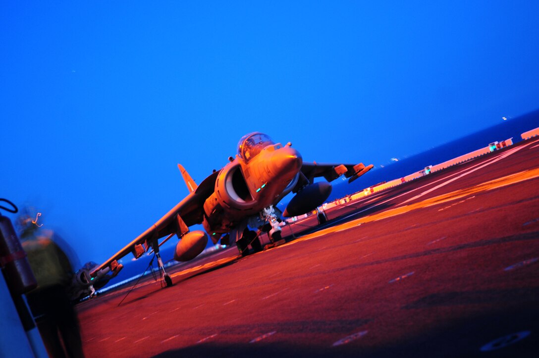 Maj. Jason Egan, Marine Attack Squadron 311 pilot, prepares to take off from the flight deck of the USS Peleliu in an AV-8B Harrier at night off the coast of California April 16, 2010. Six Harriers and approximately 80 squadron Marines left Yuma April 15 to participate in their third and final predeployment training evolution. The exercise, which began April 16 and is scheduled to end April 27, included the entire 15th Marine Expeditionary Unit. The squadron is slated to deploy to the Pacific and Indian Oceans with the 15th MEU in May. The remainder of the squadron deployed to Japan aboard the USS Essex with the 31st MEU in January. The last time the squadron deployed with the 15th MEU was in 2008.