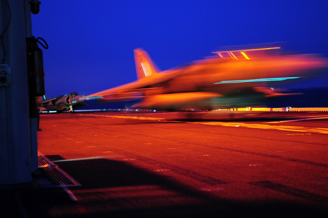 Maj. Jason Egan, Marine Attack Squadron 311 pilot, launches off the deck of the USS Peleliu in an AV-8B Harrier at night during the squadron’s final predeployment exercise April 16, 2010. Six Harriers and approximately 80 squadron Marines left Yuma April 15 to participate in their third and final predeployment training evolution off the coast of California. The exercise, which began April 16 and is scheduled to end April 27, included the entire 15th Marine Expeditionary Unit. The squadron is slated to deploy to the Pacific and Indian Oceans with the 15th MEU in May. The remainder of the squadron deployed to Japan aboard the USS Essex with the 31st MEU in January. The last time the squadron deployed with the 15th MEU was in 2008.