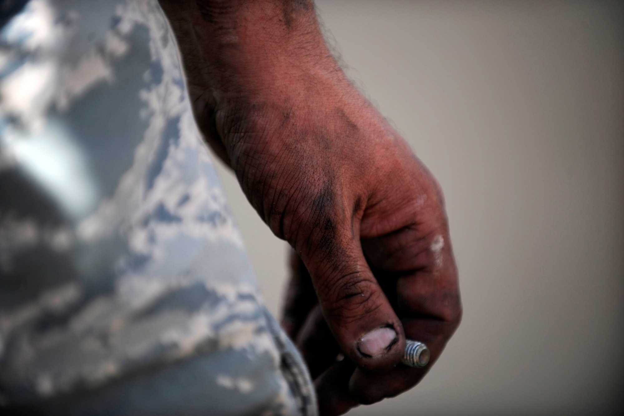 Staff Sgt. Joshua Schuldt, a vehicle maintainer assigned to the 451st Expeditionary Logistics Readiness Squadron, Detachment 1, helps install a transmission in a 25k fork lift, April 15, 2010, at Camp Bastion, Afghanistan. (U.S. Air Force photo/Staff Sgt. M. Julian Martinez/released)

