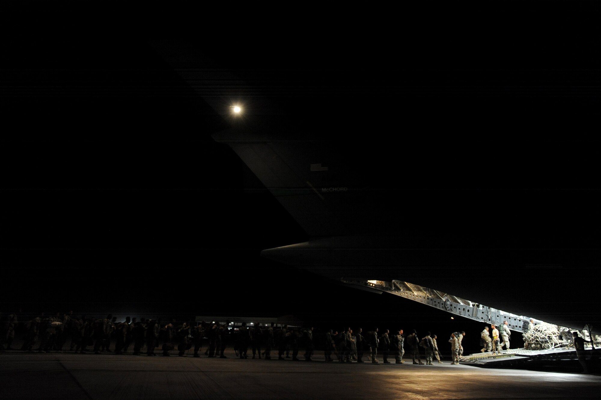 Aerial porters assigned to the 451st Expeditionary Logistics Readiness Squadron, Detachment 1 and C-17A Globemaster III loadmasters assigned to the 816th Expeditionary Airlift Squadron, load 157 Marines heading home to Camp Pendleton, Calif., April 15, 2010, at Camp Bastion, Afghanistan. (U.S. Air Force photo/Staff Sgt. M. Julian Martinez/released)


