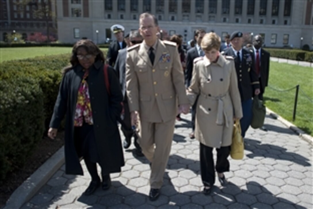 Navy Adm. Mike Mullen, chairman of the Joint Chiefs of Staff, and his wife Deborah tour the Columbia University campus in New York City, April 18, 2010. The couple has embarked on a "Conversation with the Country" tour, the first leg in a yearlong series of stops at America's universities discussing issues important to the military and how educational institutions can help veterans and their families. 