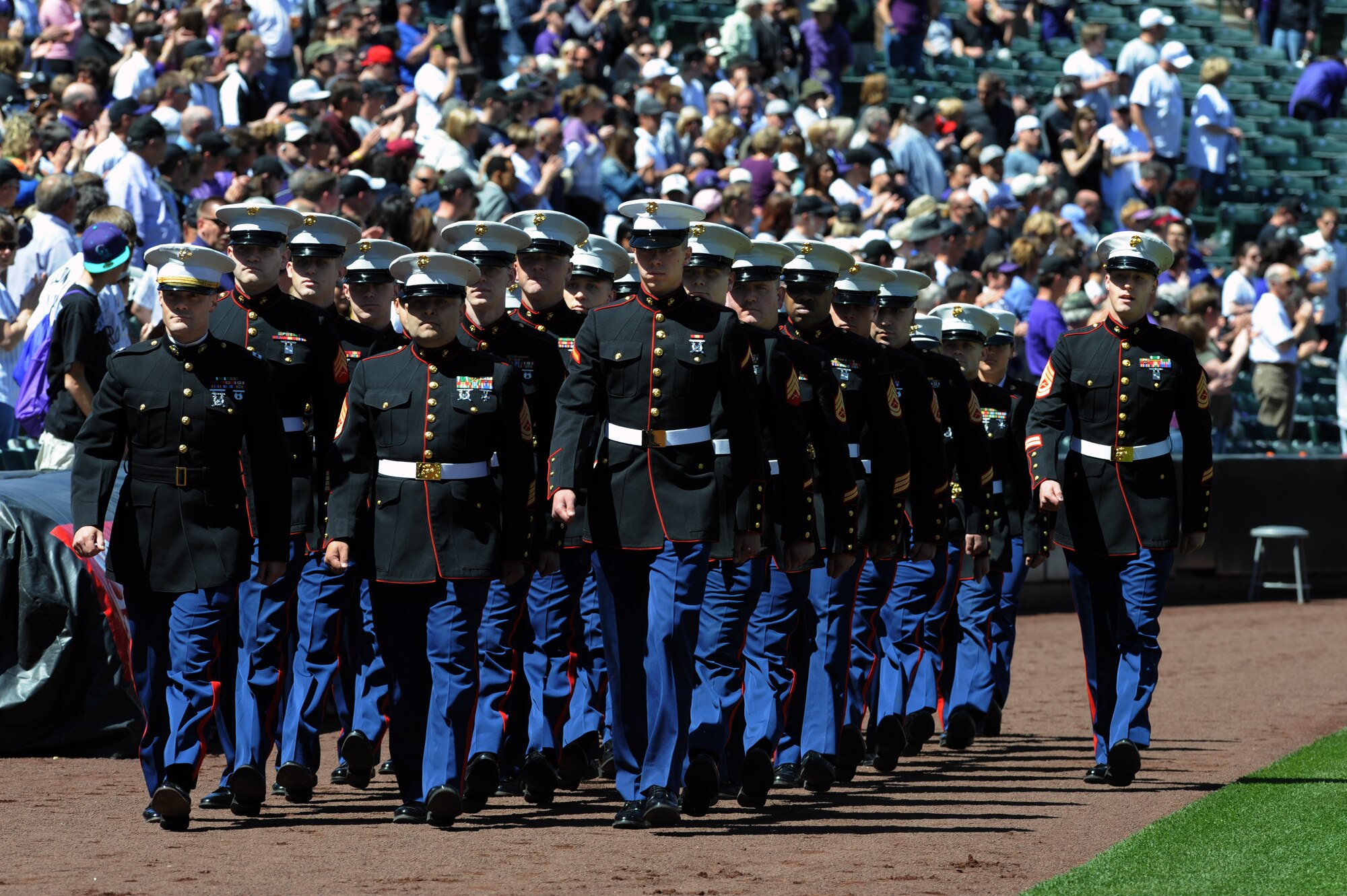 DENVER, Colo. -- Marines from Colorado recruiting stations and Buckley Air Force Base perform ceremonial guardsmen duties during the opening day festivities for the Colorado Rockies April 9. (U.S. Air Force photo by Airman 1st Class Marcy Glass)